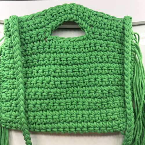 Handmade green crochet bag with fringes