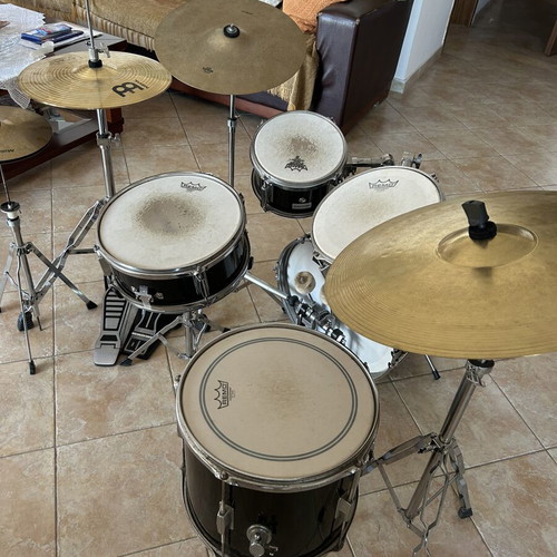 Millenium drum set used with Remo Emperor Coated heads and cymbals