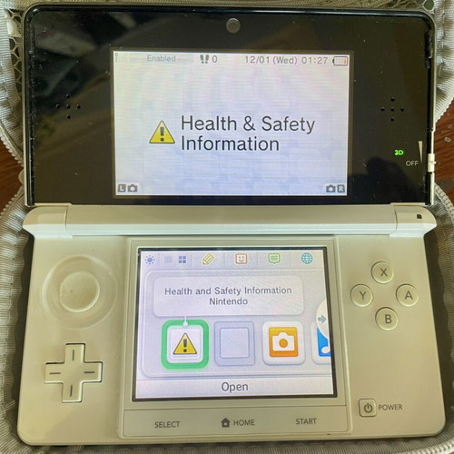 Nintendo 3DS white console with charger and case