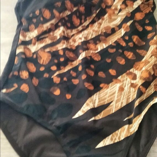One-piece swimsuit printed black with beige and brick in excellent condition