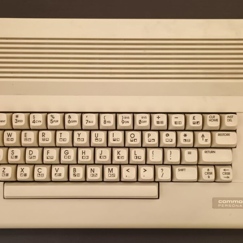 Commodore 64C used with original power supply, cassette player, and manuals