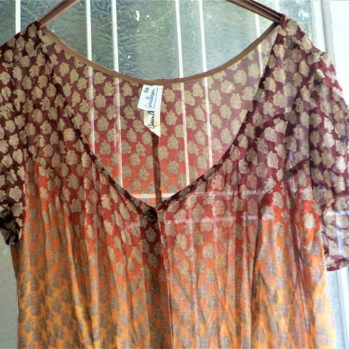 Long printed tunic used, size L, sheer fabric