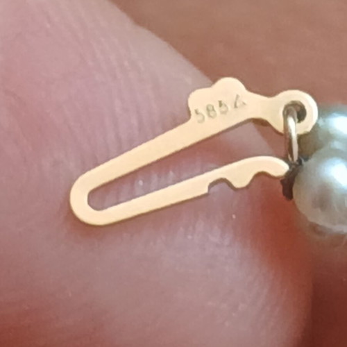 Two freshwater pearl necklaces with gold and metal clasps
