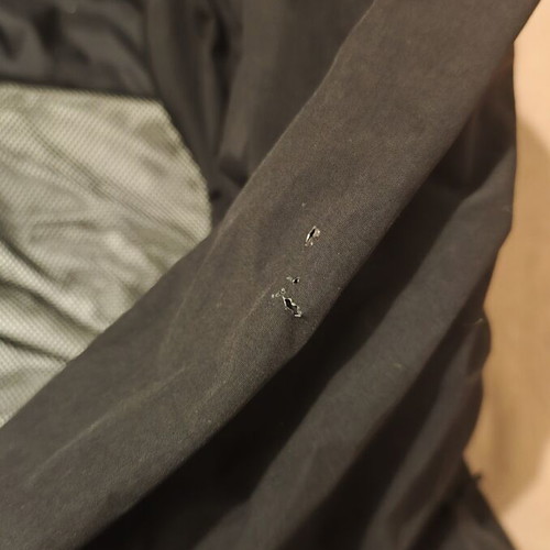 The North Face waterproof windbreaker jacket used, size large, black