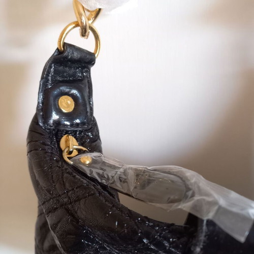 Black shoulder bag new with gold details