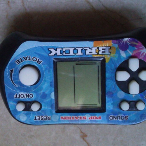 Children's handheld game similar to Tetris