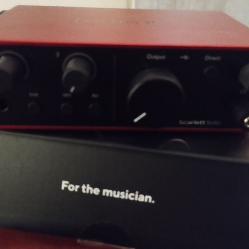 Focusrite Scarlett Solo recording system like new with microphone and headphones