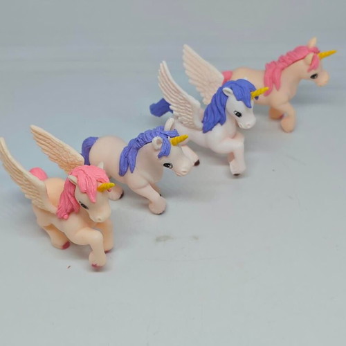 Set of 4 unicorn and pegasus figures like new
