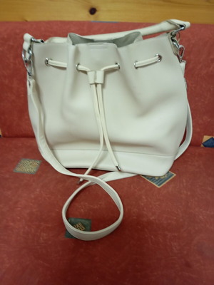 Beige drawstring crossbody bag like new with inner pocket