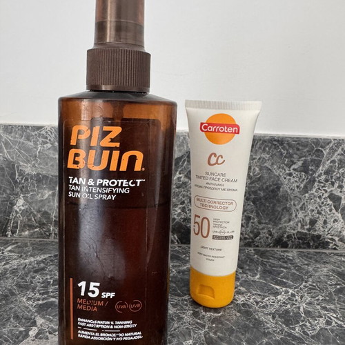 Pizbuin tanning oil SPF 15 and Carroten CC cream SPF 50 used set