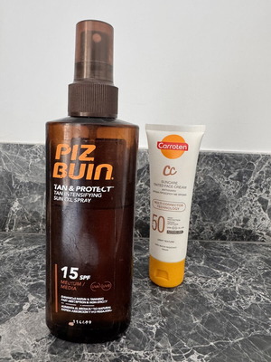 Pizbuin tanning oil SPF 15 and Carroten CC cream SPF 50 used set