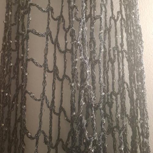 Knitted perforated scarf grey like new with beads