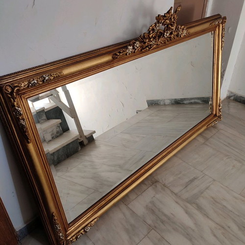 Carved mirror in gold color like new