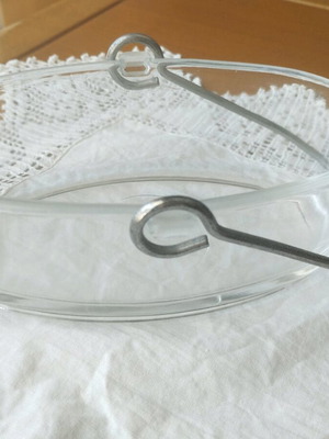 Oval glass decorative basket like new with metal handle