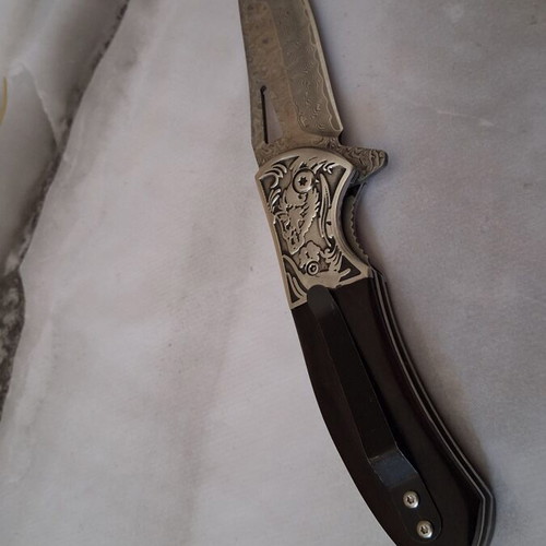 Folding knife from Damascus steel new