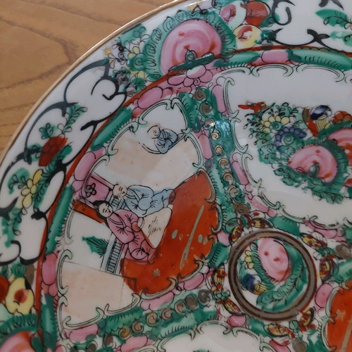 Porcelain cup decorated with Chinese style designs like new