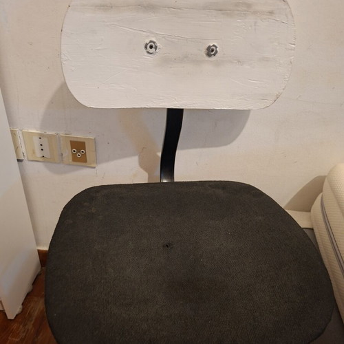 IKEA office chair used with slightly torn fabric and missing head cushion