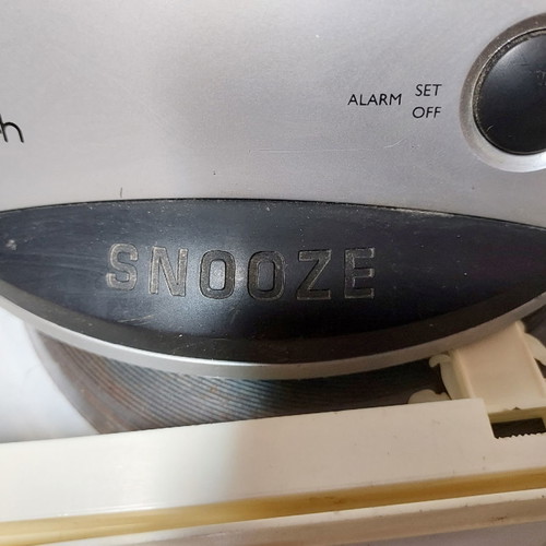 Table clock radio used with AM/FM and alarm