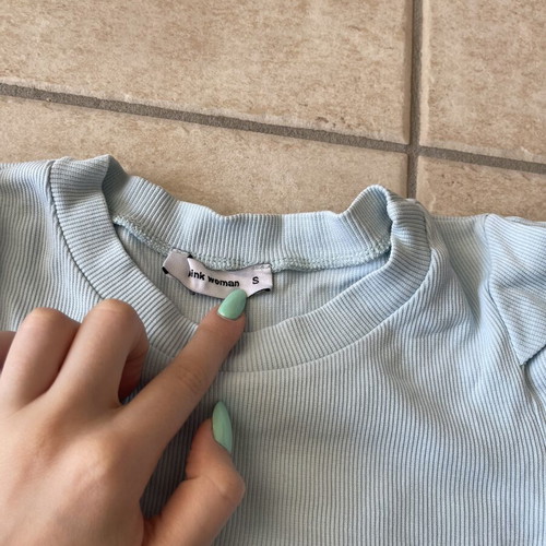 Pink Woman blue shirt size S used with defect