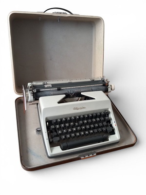 Olympia typewriter used with carrying case