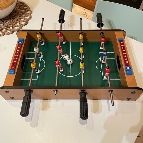 Foosball table used with two balls in excellent condition