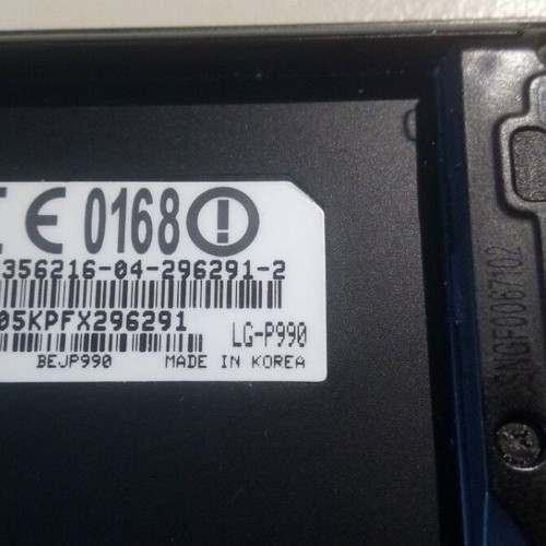 LG Ρ990 functional smartphone with charger and minor screen scratches