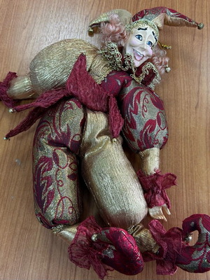 Decorative clown doll used with festive costume