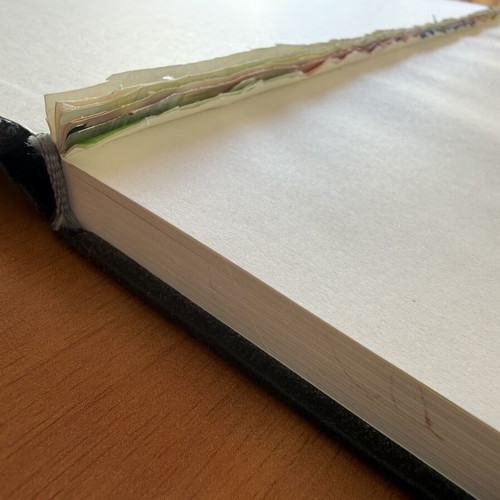 Black sketchbook with fabric cover, 127 sheets