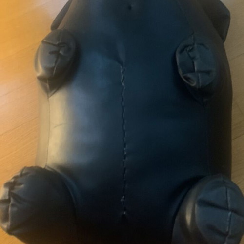Vintage black leather pig footstool, early 2000s
