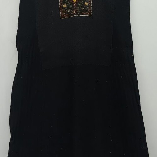 Collectible traditional wool dress used with yellow border