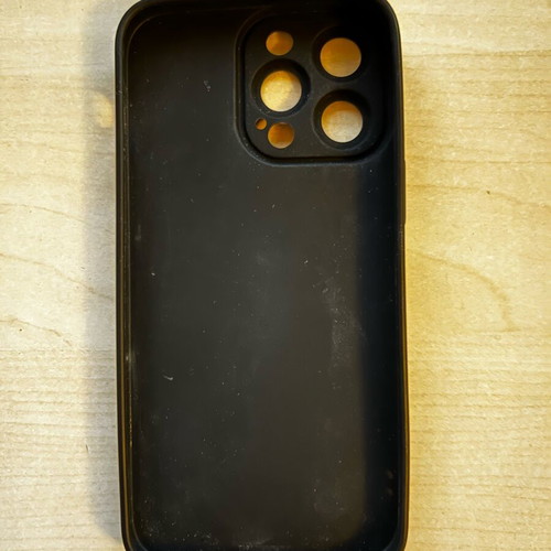 iPhone 13 Pro Max case used, black with cat design