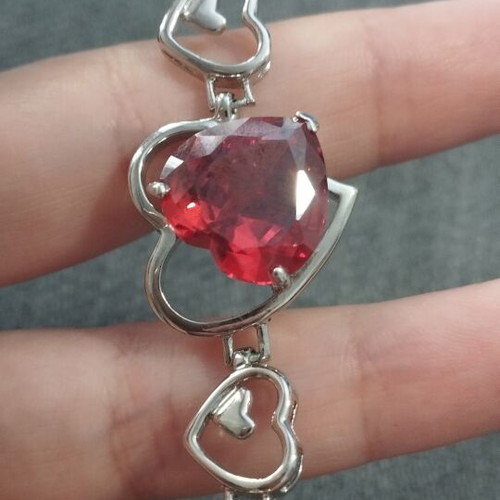 Women's bracelet with red crystal heart and silver elements, like new