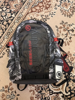 Superdry Camo Tarp Backpack new, grey black camouflage with red accents