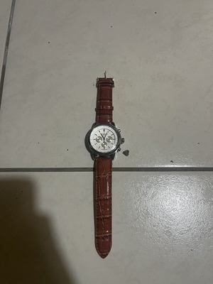 P.P Watch like new, white and brown