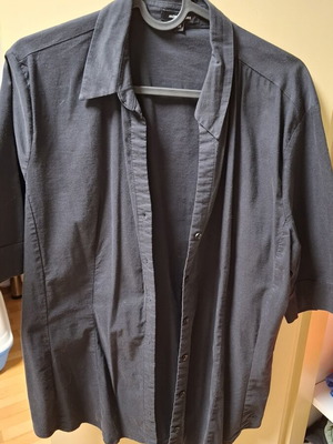 More black shirt used, size XXL