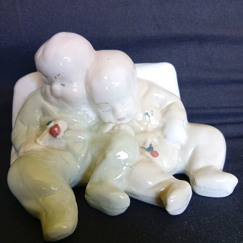 Porcelain figurine of twin babies like new