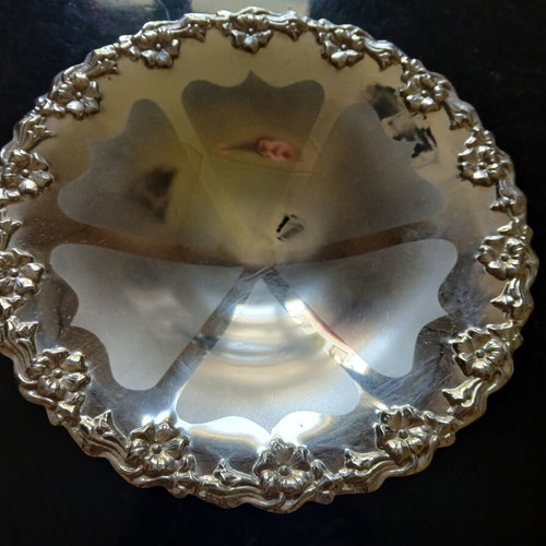 Vintage metal decorative serving platter used with floral design