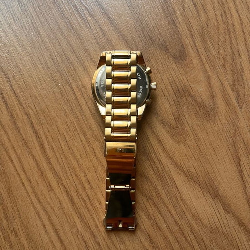 Elixa women's watch like new, gold bracelet with crystals