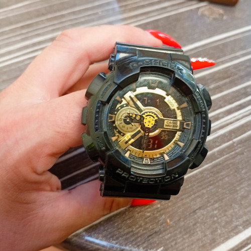 Casio G-Shock GA-110GB black and gold watch like new