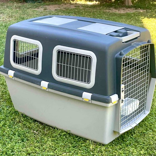 Large dog carrier cage like new with food container 78x45x64