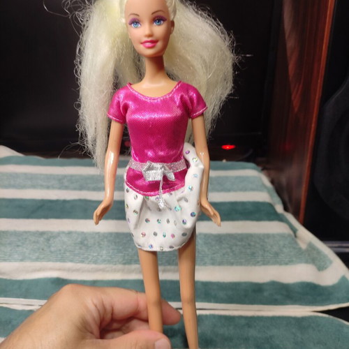 Barbie doll Mattel used with stains on dress