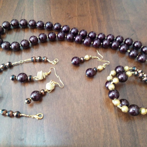 Set of handmade jewelry with burgundy glass pearls like new