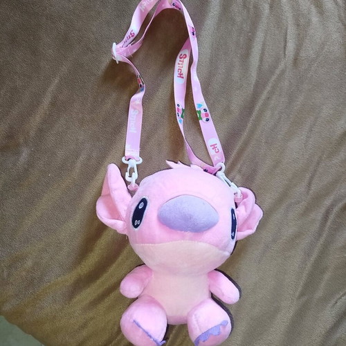 Stilch crossbody bag like new, plush with adjustable strap