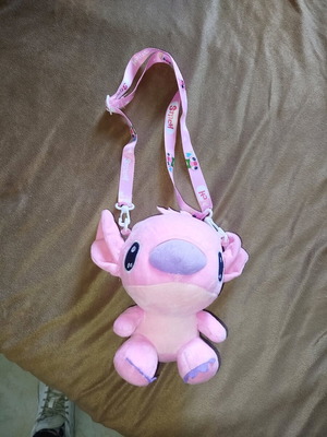 Stilch crossbody bag like new, plush with adjustable strap