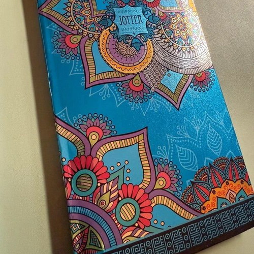 School supplies set with notebooks, pens, pencils, stickers, and case