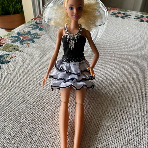 Collectible Barbie doll like new, well preserved and clean