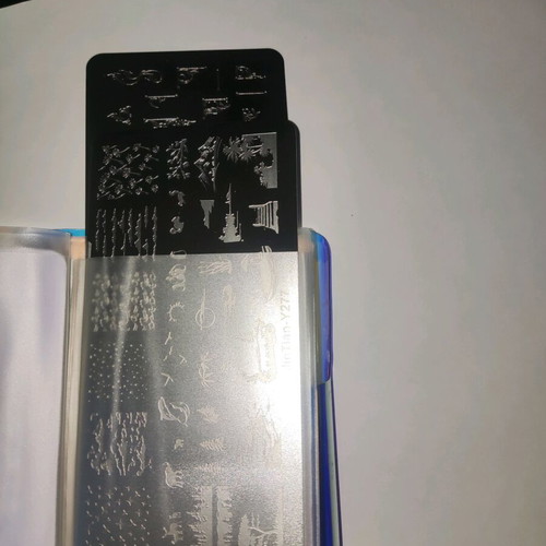 Nail stamping plates like new with storage book