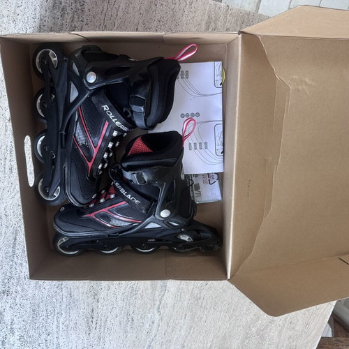 Rollerblades used, size 38.5-40.5, red with protective gear