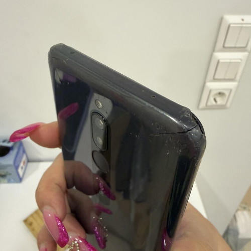 Xiaomi Redmi 8 smartphone used with cracked screen and damages
