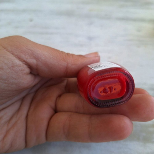Manoli MC red nail polish like new